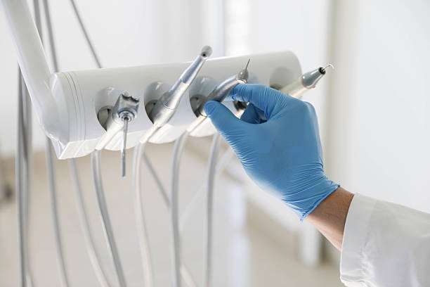 Professional Dental Implants technician working in DeWitt, IA